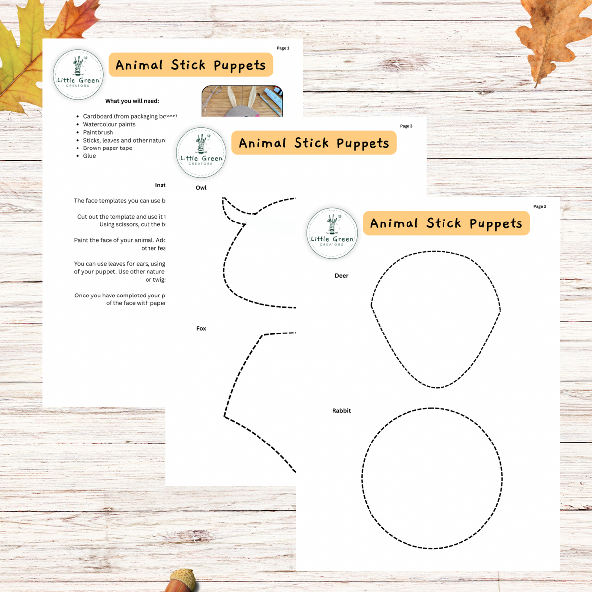 Three printable cards for animal stick puppets titled Animal Stick Puppets, laid on a whitewashed wood surface with autumn leaves. The cards show templates for an owl and a fox to cut out and instructions.